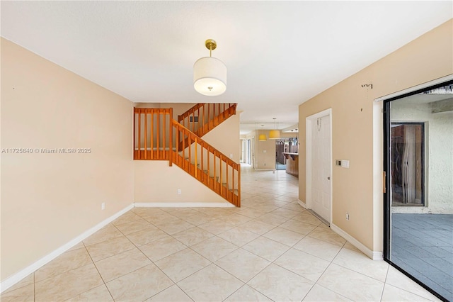 empty room featuring light tile patterned floors