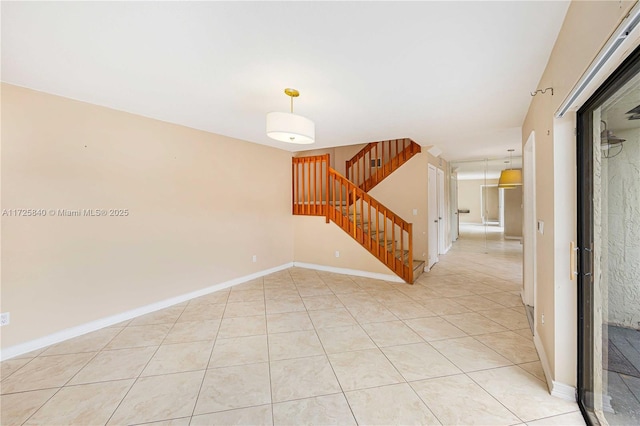 spare room with light tile patterned flooring