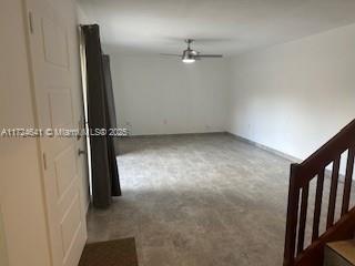 unfurnished room featuring ceiling fan