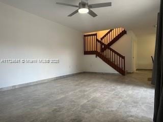 unfurnished room featuring ceiling fan