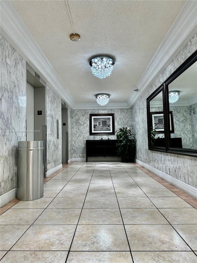 hallway with a textured ceiling, elevator, a chandelier, light tile patterned floors, and crown molding