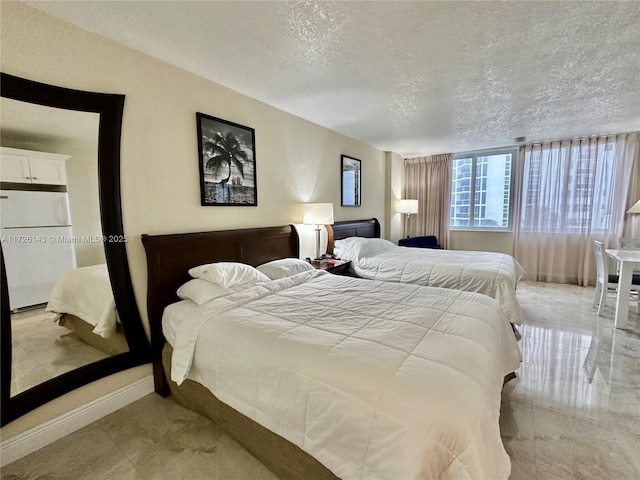 bedroom with a textured ceiling