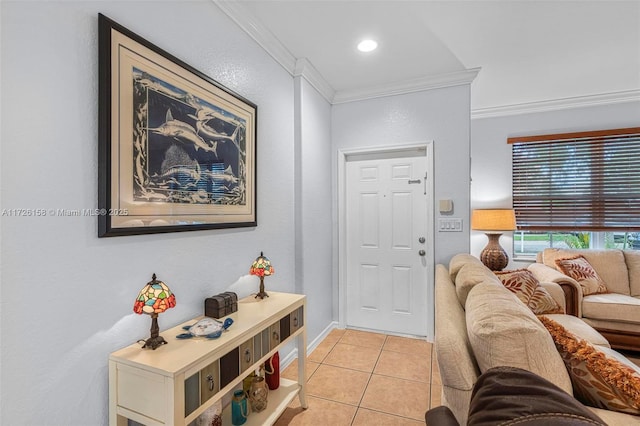 tiled entrance foyer with crown molding