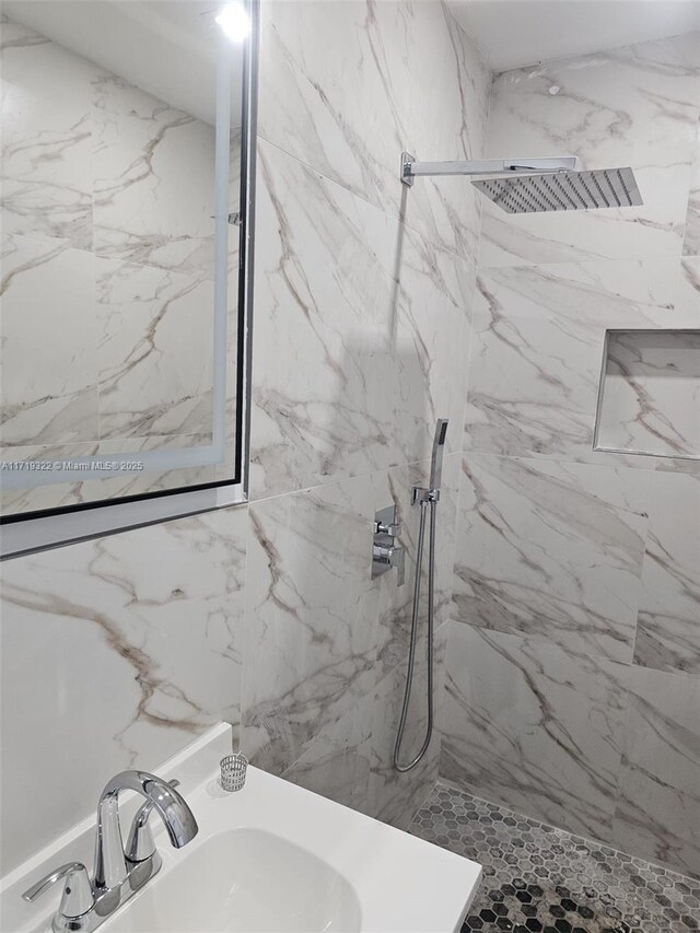 bathroom featuring tile walls, toilet, and vanity