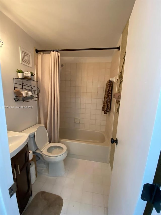 full bathroom featuring shower / bath combination with curtain, vanity, and toilet