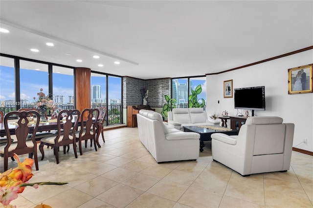 living room featuring a wall of windows, light tile patterned flooring, and plenty of natural light