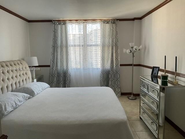 bedroom featuring crown molding