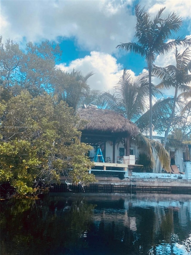 view of community featuring a gazebo and a water view