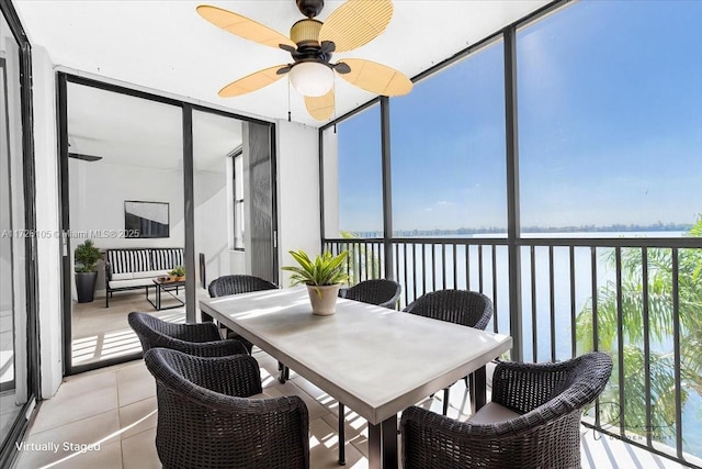 110 Lake Emerald Dr Unit 403, Oakland Park, FL 33309 - sunroom featuring ceiling fan, outdoor dining area, and a water view