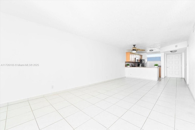 110 Lake Emerald Dr Unit 403, Oakland Park, FL 33309 - unfurnished living room with ceiling fan and baseboards