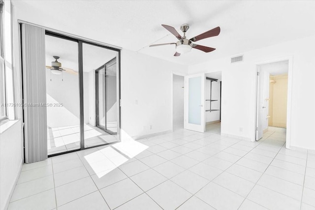 110 Lake Emerald Dr Unit 403, Oakland Park, FL 33309 - interior space with visible vents, ceiling fan, access to exterior, and baseboards