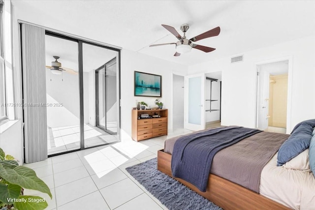 110 Lake Emerald Dr Unit 403, Oakland Park, FL 33309 - bedroom with light tile patterned floors, access to exterior, visible vents, and a ceiling fan