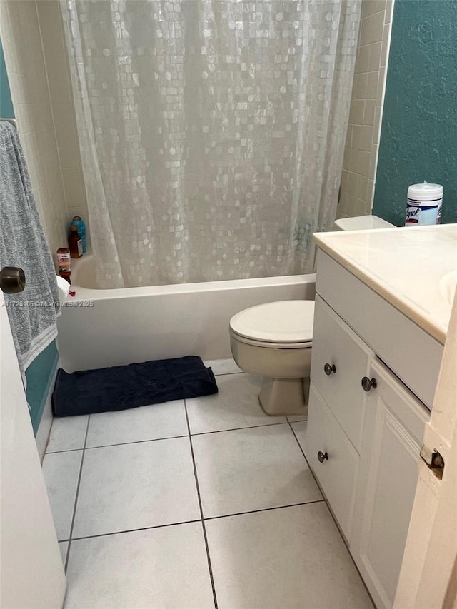 full bathroom with vanity, toilet, tile patterned floors, and shower / bath combo