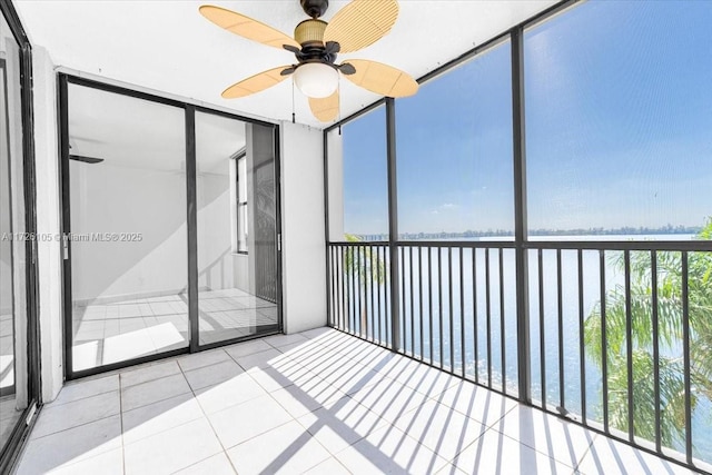 110 Lake Emerald Dr Unit 403, Oakland Park, FL 33309 - unfurnished sunroom with a ceiling fan and a water view