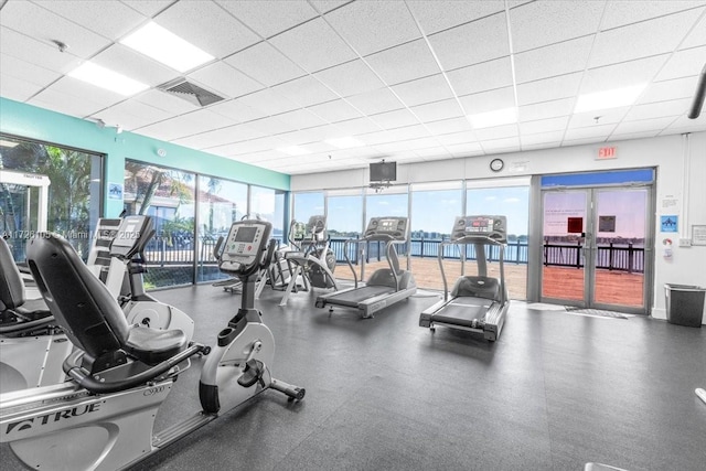 110 Lake Emerald Dr Unit 403, Oakland Park, FL 33309 - exercise room featuring visible vents and a paneled ceiling