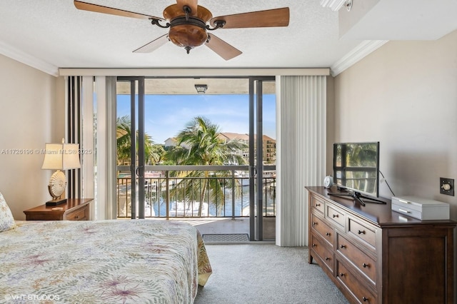 bedroom with access to outside, ceiling fan, light carpet, and multiple windows