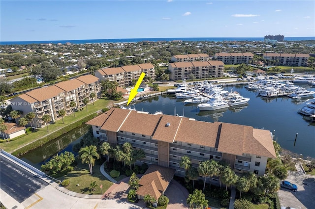 drone / aerial view featuring a water view