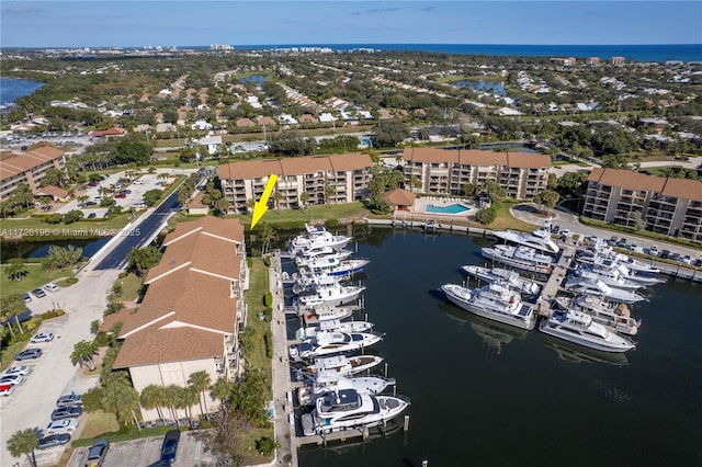 drone / aerial view with a water view