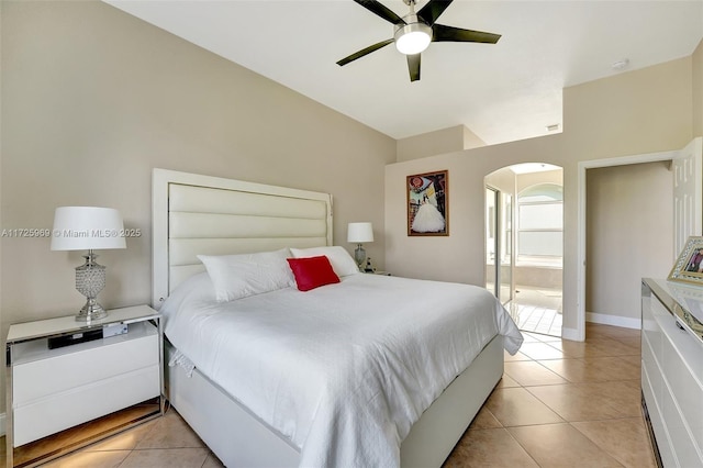 bedroom featuring ceiling fan and light tile patterned flooring