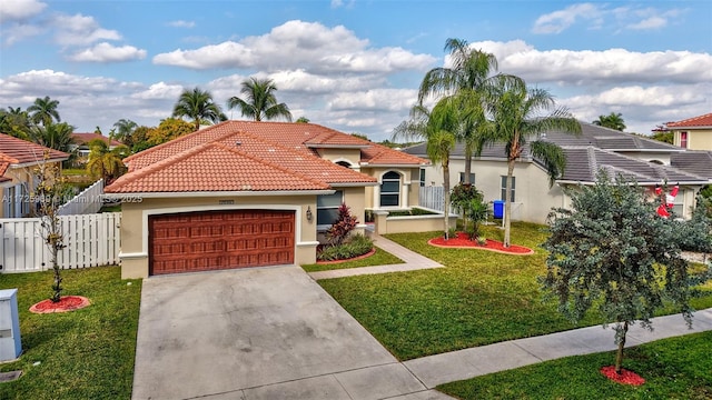 mediterranean / spanish-style house with a front yard and a garage