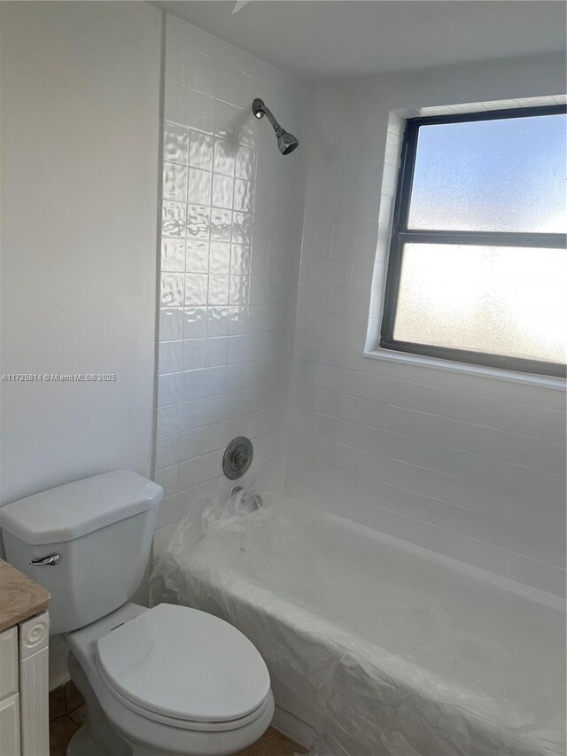 spare room featuring a textured ceiling and ceiling fan