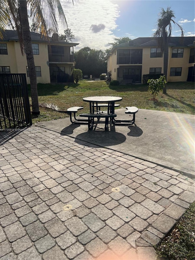 surrounding community featuring a patio area