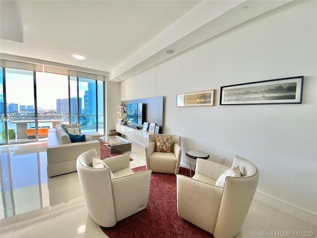 tiled living room featuring expansive windows