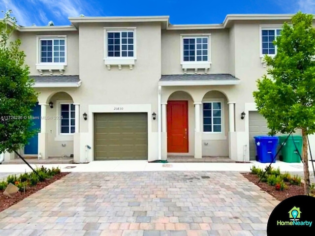 view of front of property featuring a garage