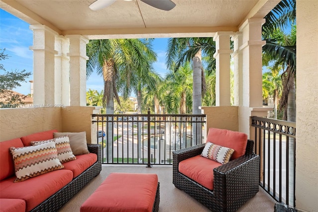 balcony featuring ceiling fan