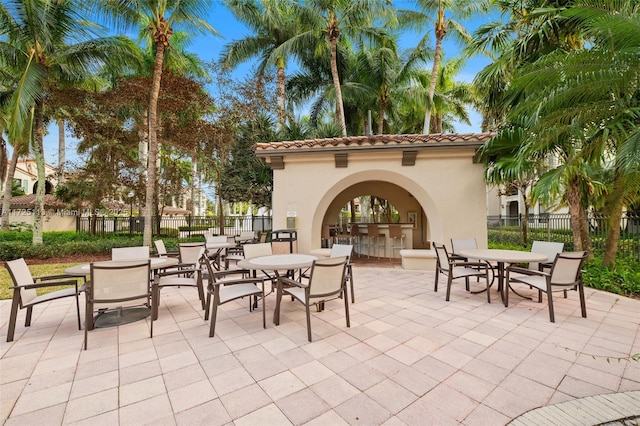 view of patio with exterior bar