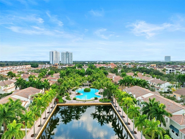 birds eye view of property featuring a water view