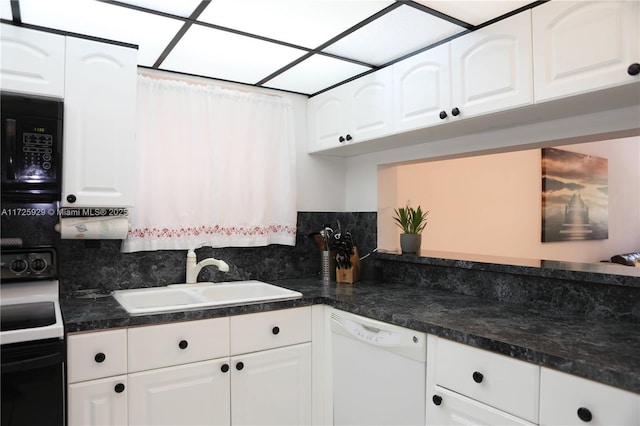 kitchen featuring sink, white cabinetry, tasteful backsplash, and dishwasher