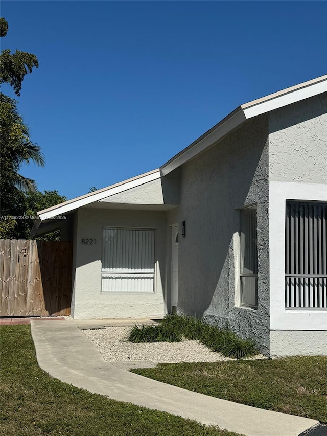 view of home's exterior featuring a yard