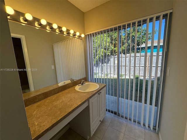 bathroom with vanity and tile patterned floors