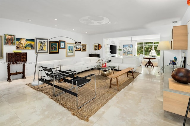 living room featuring ceiling fan