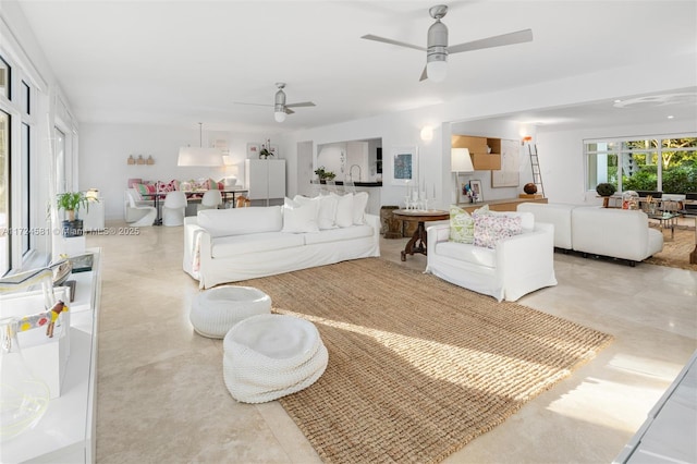 living room with ceiling fan