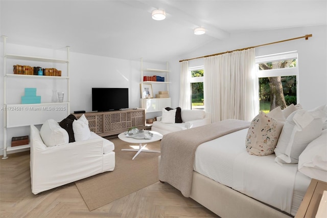 bedroom with light parquet flooring and vaulted ceiling with beams