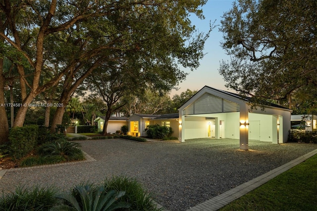 view of front of property with a garage