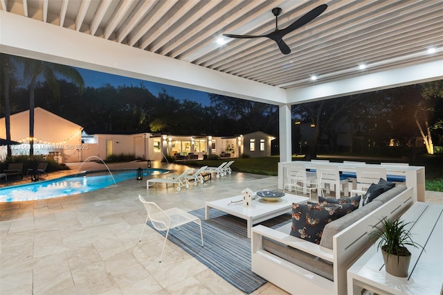 view of patio with ceiling fan, outdoor lounge area, and pool water feature