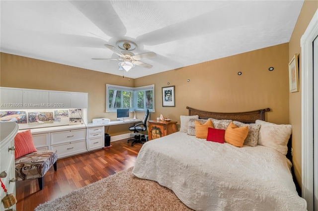 bedroom featuring dark wood-type flooring and ceiling fan