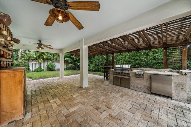 view of patio featuring grilling area, ceiling fan, a pergola, and area for grilling