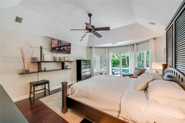 bedroom with ceiling fan, dark hardwood / wood-style flooring, and vaulted ceiling