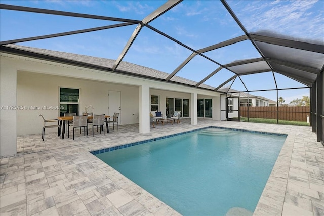 view of pool with a lanai and a patio area