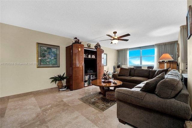 living room with ceiling fan