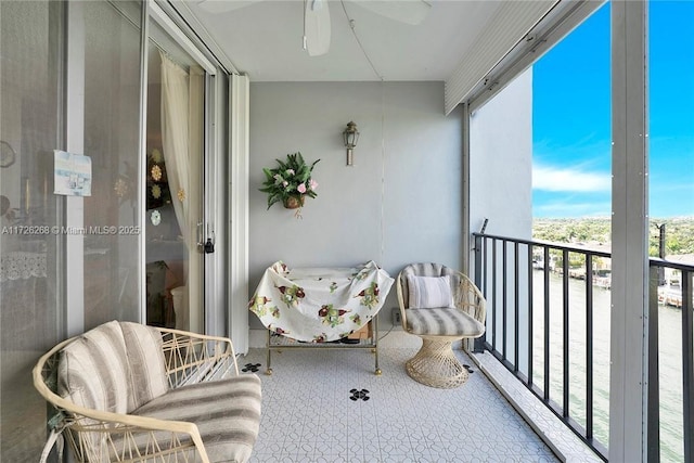 balcony featuring ceiling fan