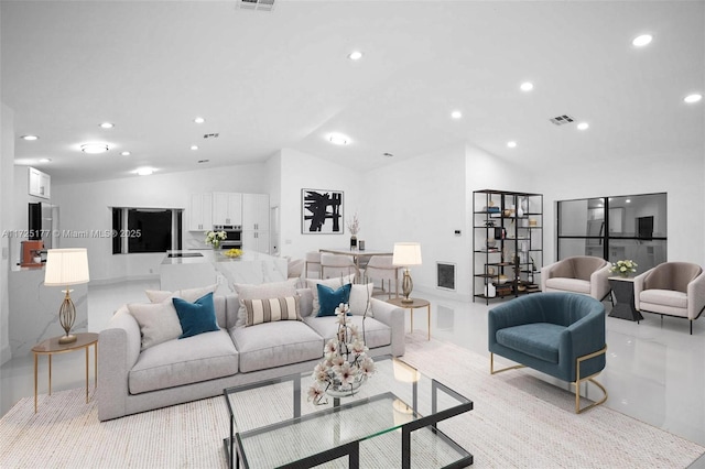 living room with lofted ceiling