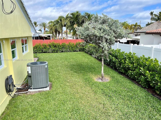 view of yard featuring central AC