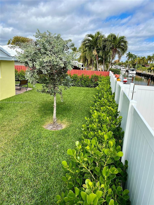 view of yard with a water view