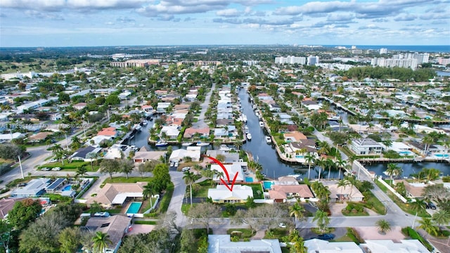 bird's eye view with a water view