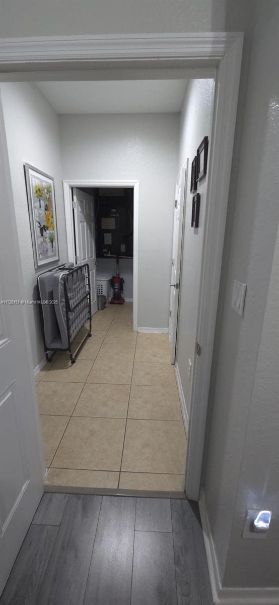 corridor featuring light hardwood / wood-style flooring